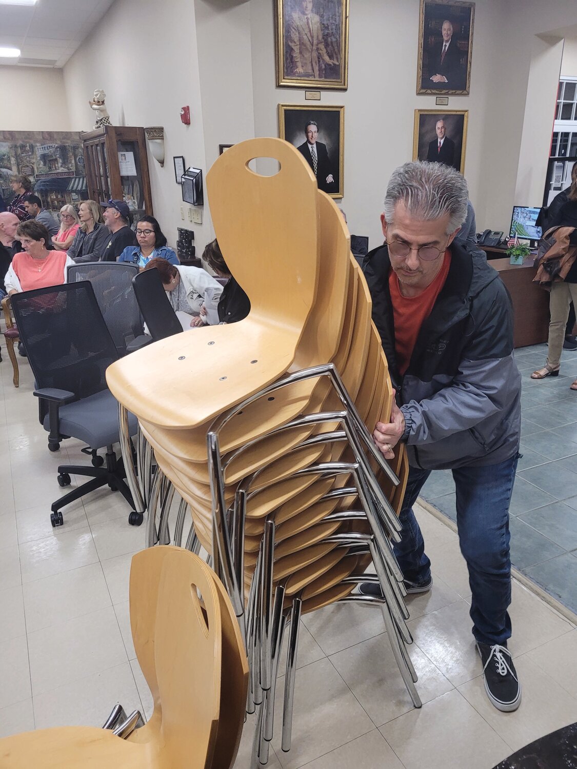 EXTRA SEATS: For a while, it was standing-room-only at the Senior Center. Extra chairs were brought in to the meeting space.